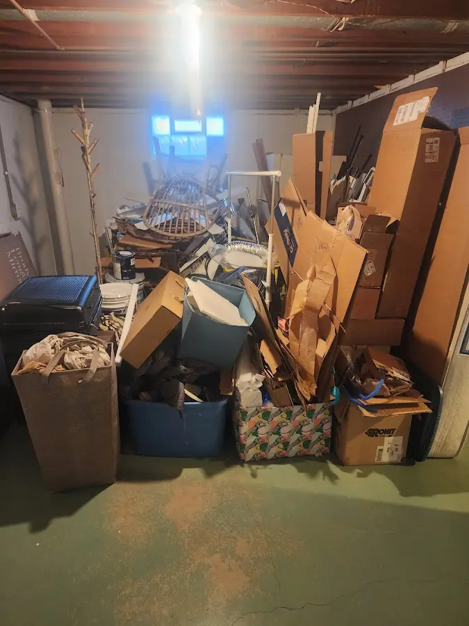 Roll-off dumpster container at job site for 4 Yard Dumpster Rental in Byron